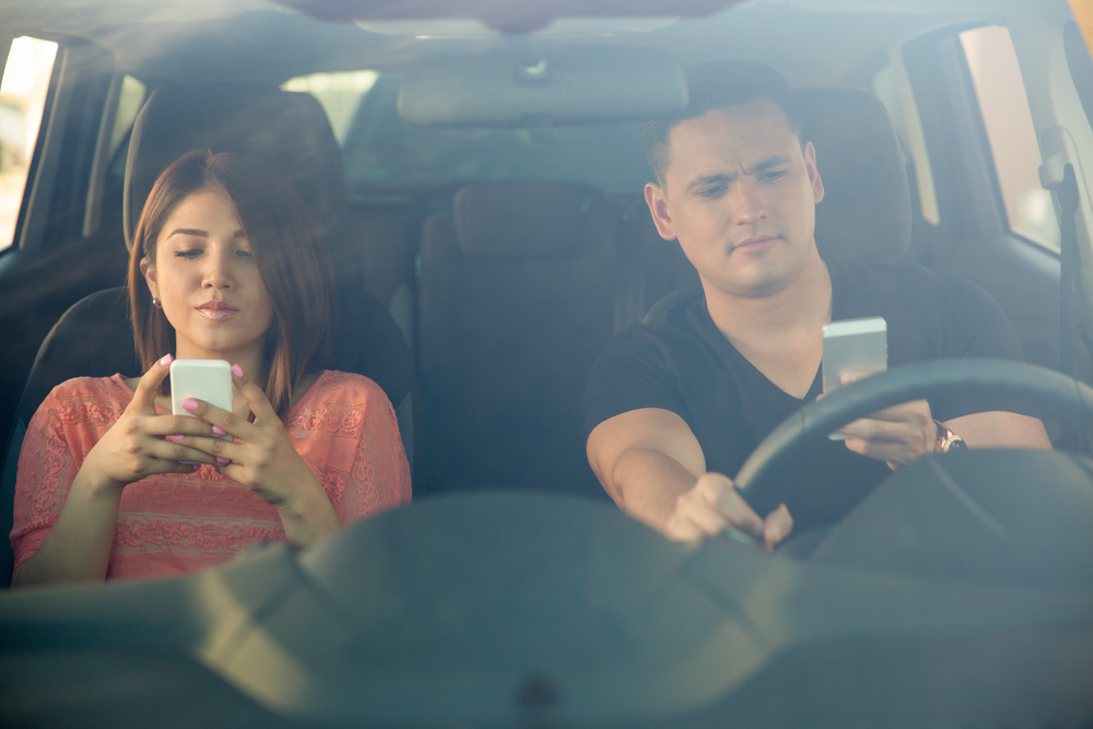 8 Ways You're Distracting Yourself While You Drive